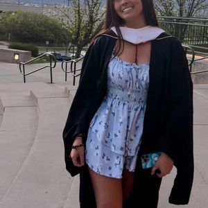 Light Blue Floral Romper. Light Blue Floral Smocked Skirt Overlay Dromper.